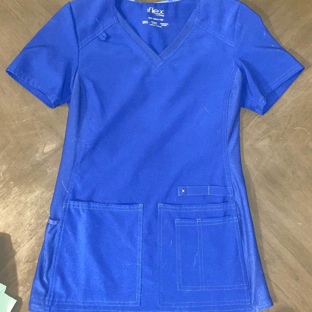 Cherokee Iflex Women's V-Neck Solid Knit Panel Scrub Top in color Galaxy Blue